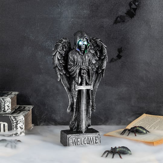 Glitzhome® 12" Halloween Lighted Resin Grim Reaper Table Decor with Timer